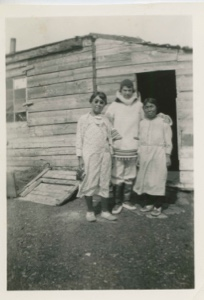 Image: F. Alliger visiting two Eskimo [Inuit] women in front of their house